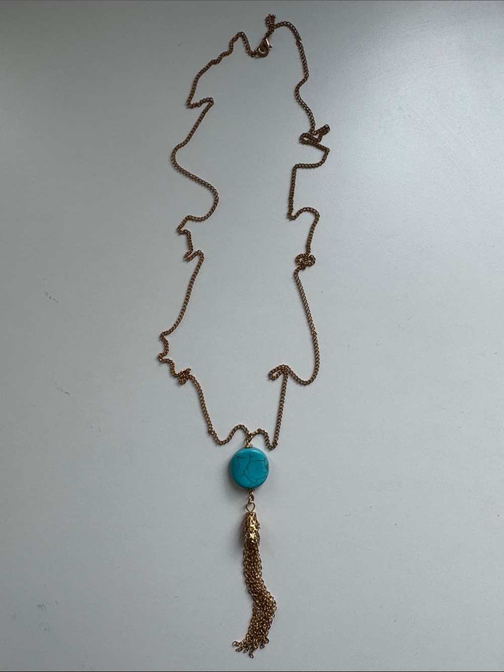 Gold-Tone Necklace with Turquoise Stone Pendant and Tassel